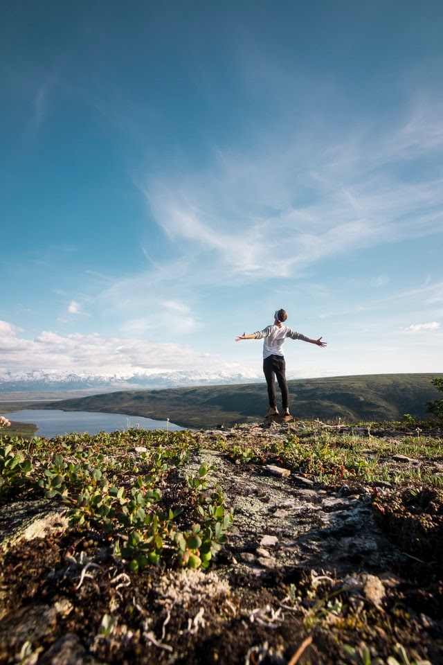 confident person looking at sky